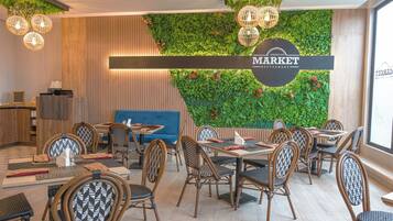 Breakfast, lunch, dinner served; international cuisine