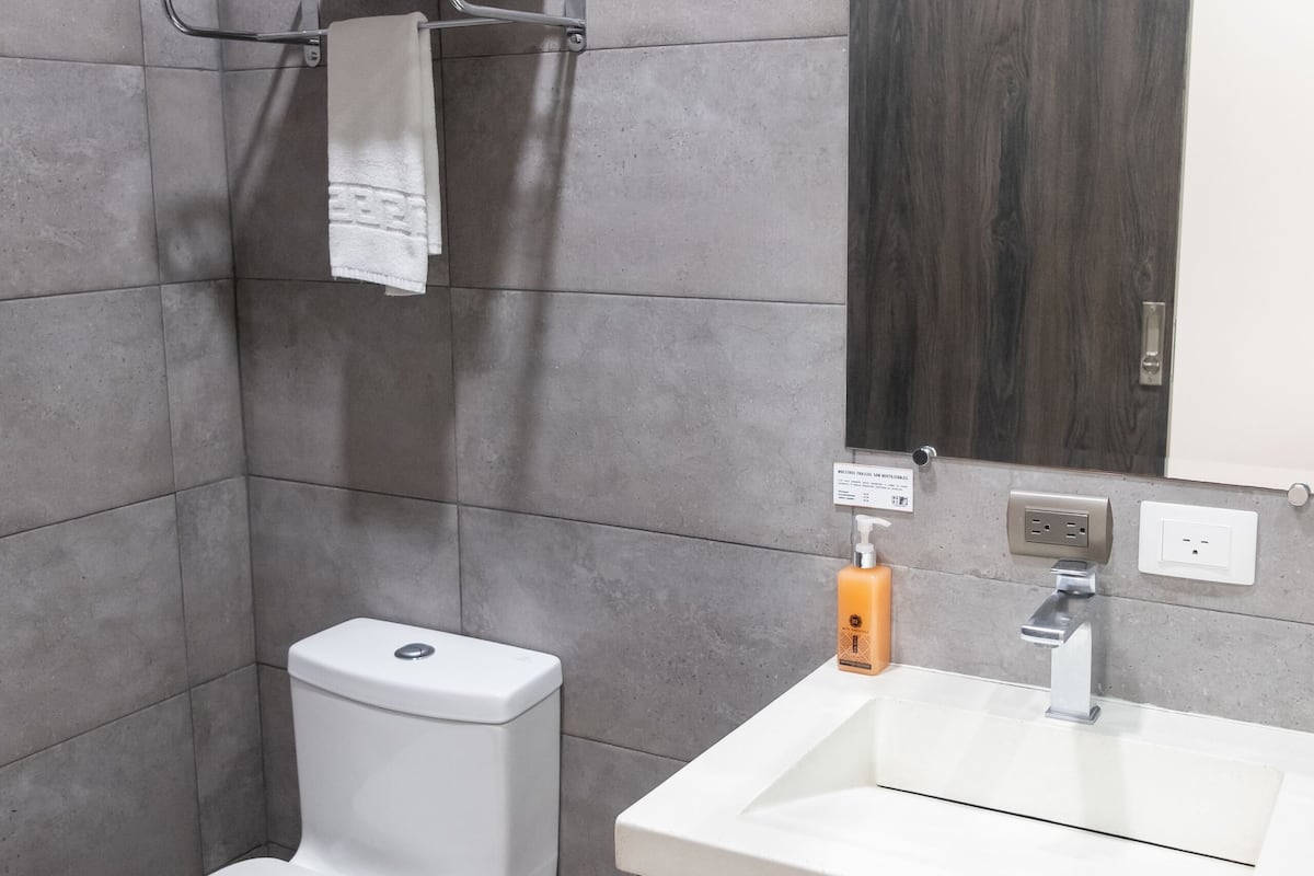 shower, rainfall showerhead, towels, soap