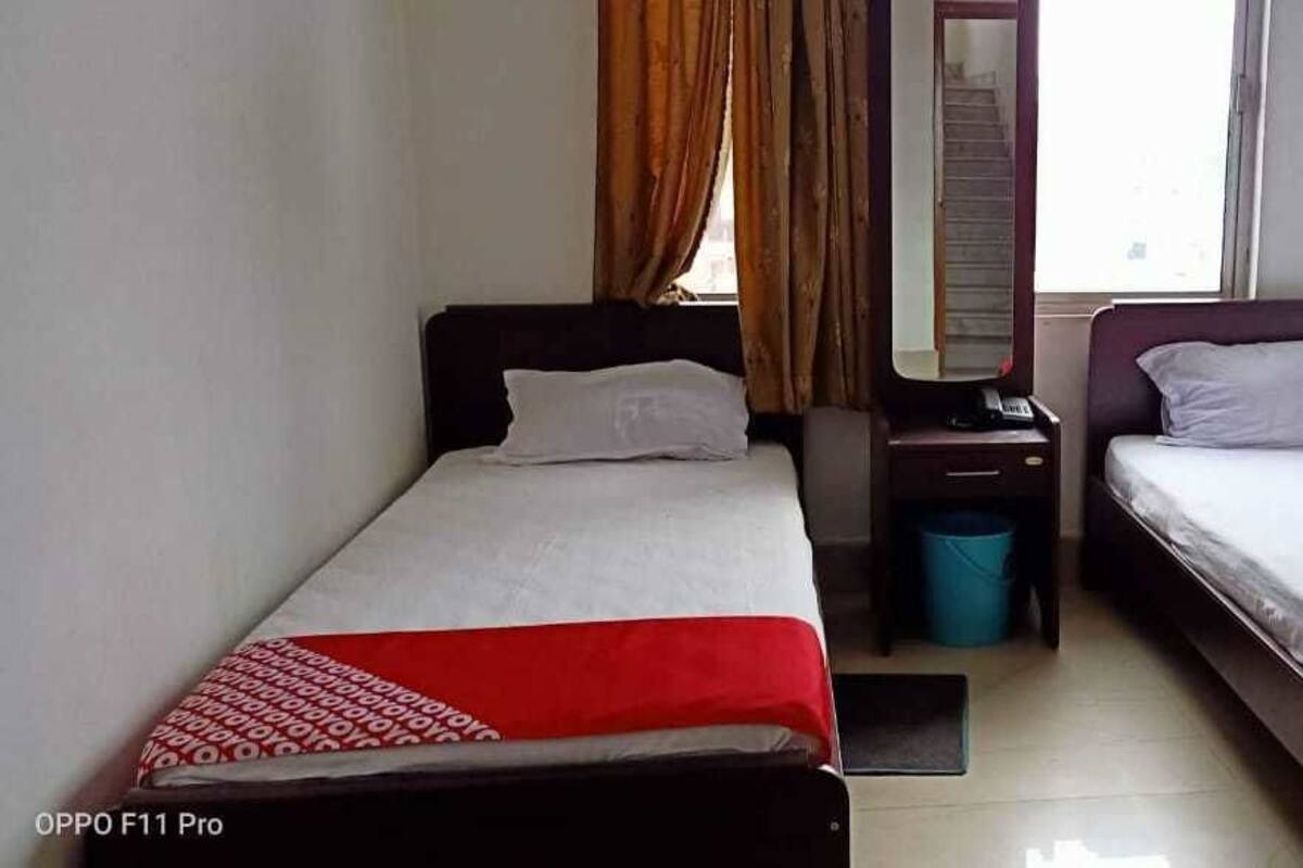 Habitación doble Deluxe, 2 camas individuales | Camas extra y wifi gratis