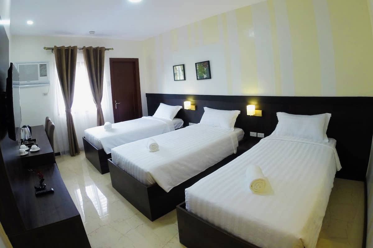 Kamar Triple | Meja kerja, Wi-Fi gratis, dan seprai linen