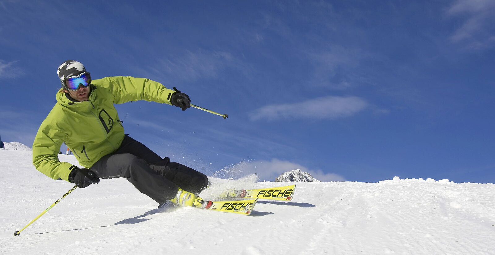 A person skiing on a snowy slope.