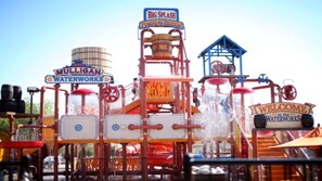 A water park with a water slide, a water pump station, and a welcome sign. - Holiday Inn Express & Suites Murrieta by IHG (Murrieta)