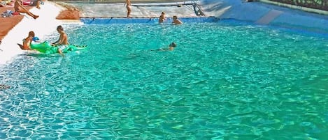 Seasonal outdoor pool, pool umbrellas, sun loungers