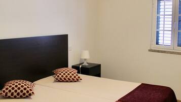 1 habitación, cortinas blackout y sistema de insonorización