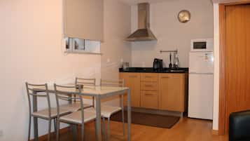 Apartment, City View | Private kitchenette | Fridge, microwave, oven, stovetop