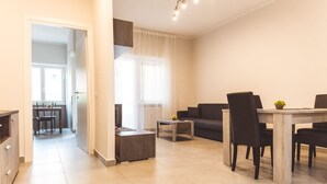 Appartement, 1 chambre | Coin séjour | Télévision à écran plat