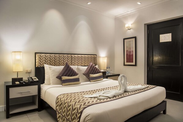 Memory-foam beds, minibar, in-room safe, desk