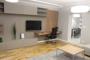 Home Living Spa | Oppholdsområde | Flatskjerm-TV