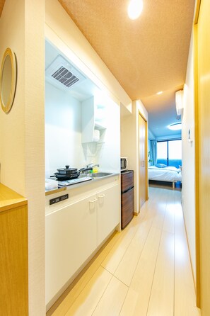 Luxe Twin kamer | Privékitchenette | Een koelkast, een microgolfoven, een kookplaat, een kookplaat