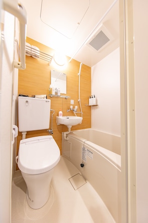 Basic Double Room | Bathroom | Hair dryer, electronic bidet, towels, soap