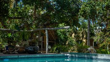 Outdoor pool, open 7:00 AM to 9:00 PM, sun loungers