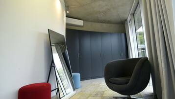 Premium bedding, desk, laptop workspace, blackout drapes