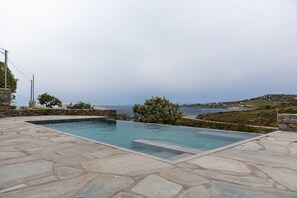 Seasonal outdoor pool, an infinity pool, sun loungers