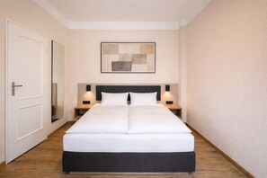 Ropa de cama hipoalergénica, minibar, cortinas opacas