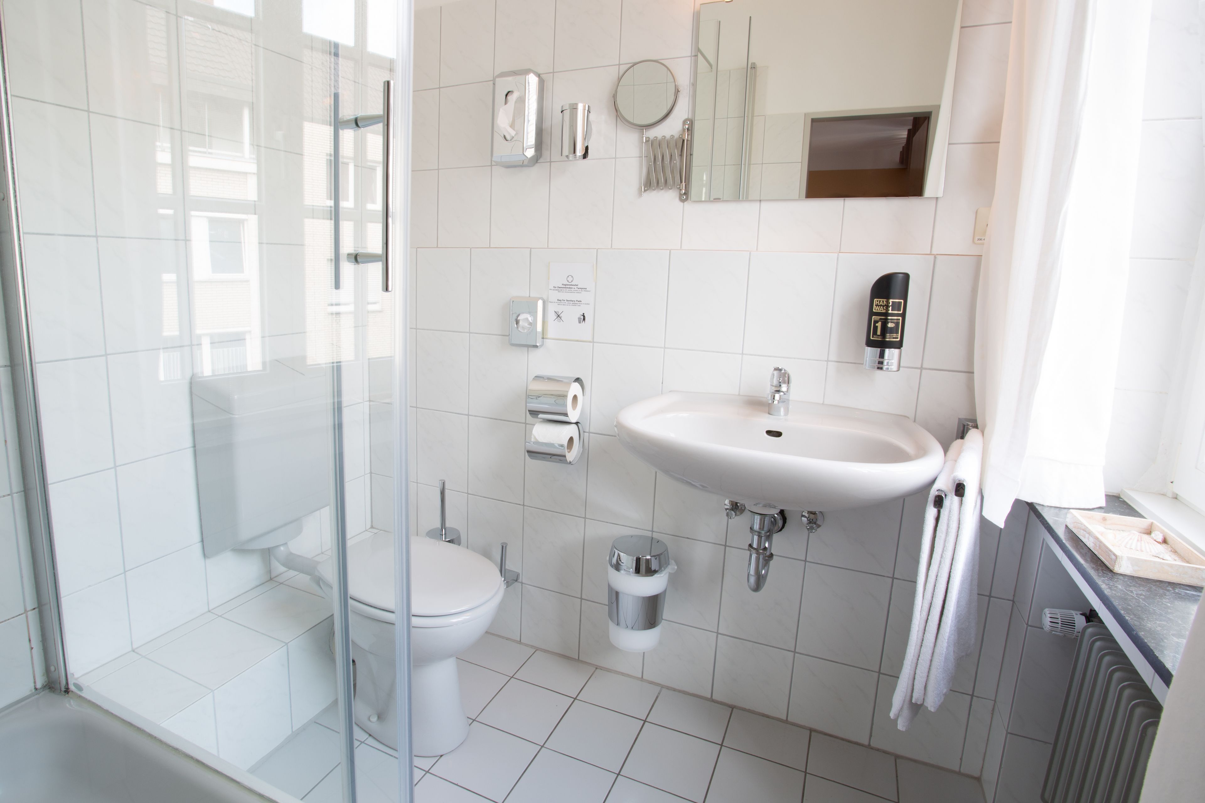 shower, free toiletries, hair dryer, towels