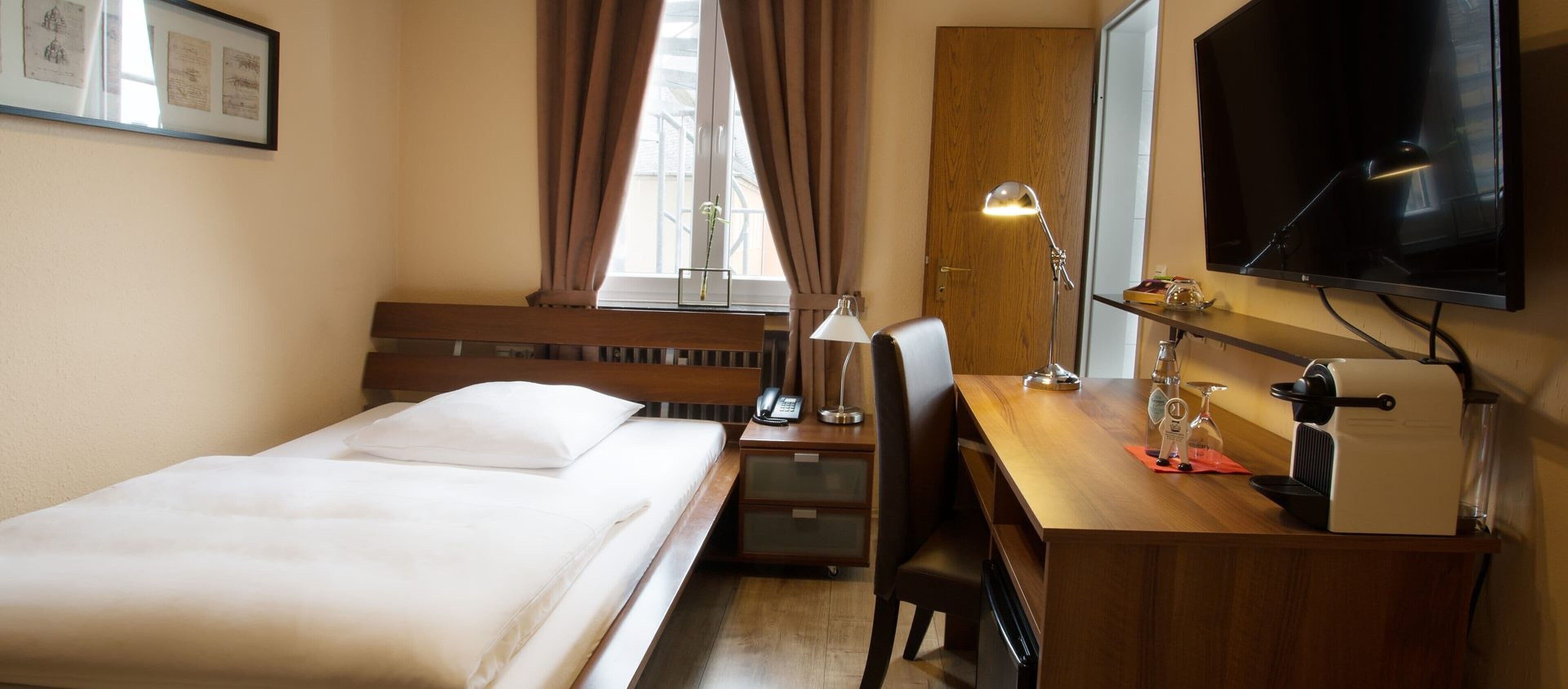 hypo-allergenic bedding, minibar, blackout curtains, iron/ironing board