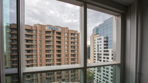 A view from a window of a multi-story building with a sign reading "mantra". - City Living At Best Location In Melbourne (Melbourne)