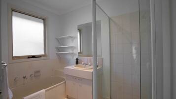 Shower, hydromassage showerhead, hair dryer, towels