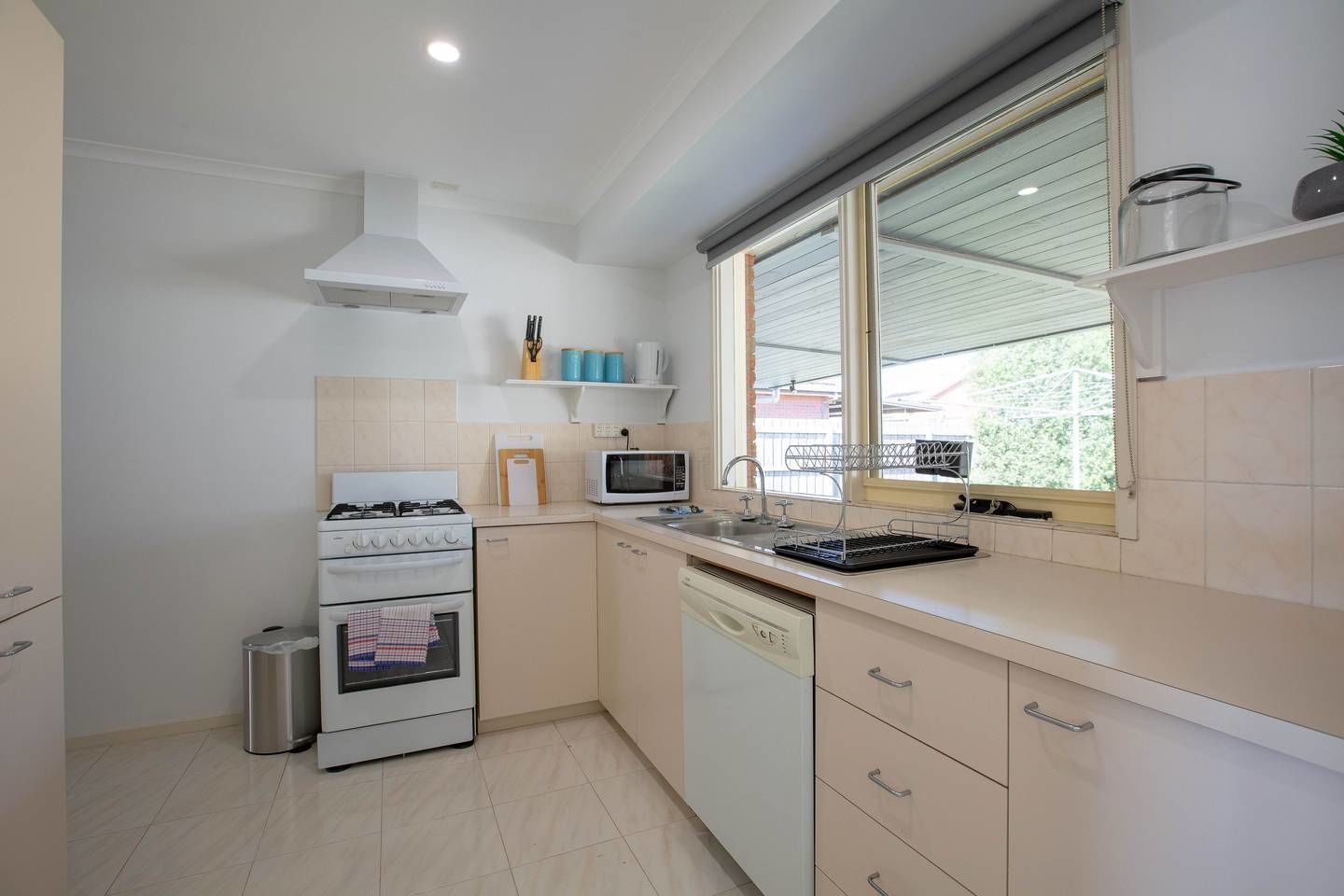 Fridge, microwave, oven, cookware/dishes/utensils