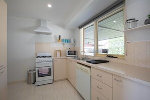 Fridge, microwave, oven, cookware/dishes/utensils