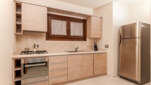 Villa, 5 Bedrooms | Private kitchen | Full-size fridge, oven, stovetop, dishwasher - Villa Pevero Hills 5 (Arzachena)