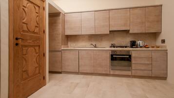 Villa, 6 Bedrooms | Private kitchen | Full-sized fridge, oven, dishwasher, espresso maker