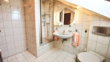Apartment, 2 Bedrooms | Bathroom | Shower, free toiletries, hair dryer, towels