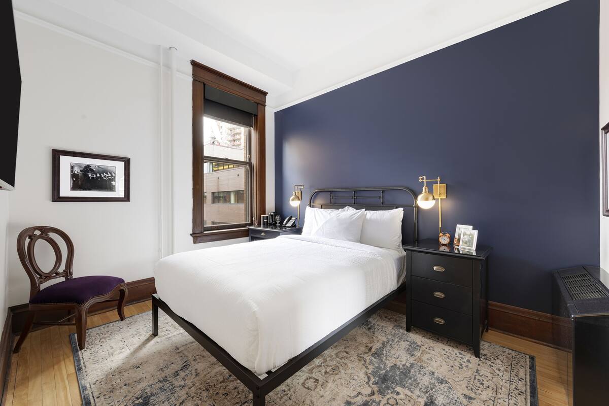 Premium bedding, pillowtop beds, blackout drapes, WiFi (free)