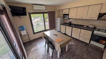 Family Apartment | Private kitchen | Full-size fridge, microwave, oven, stovetop