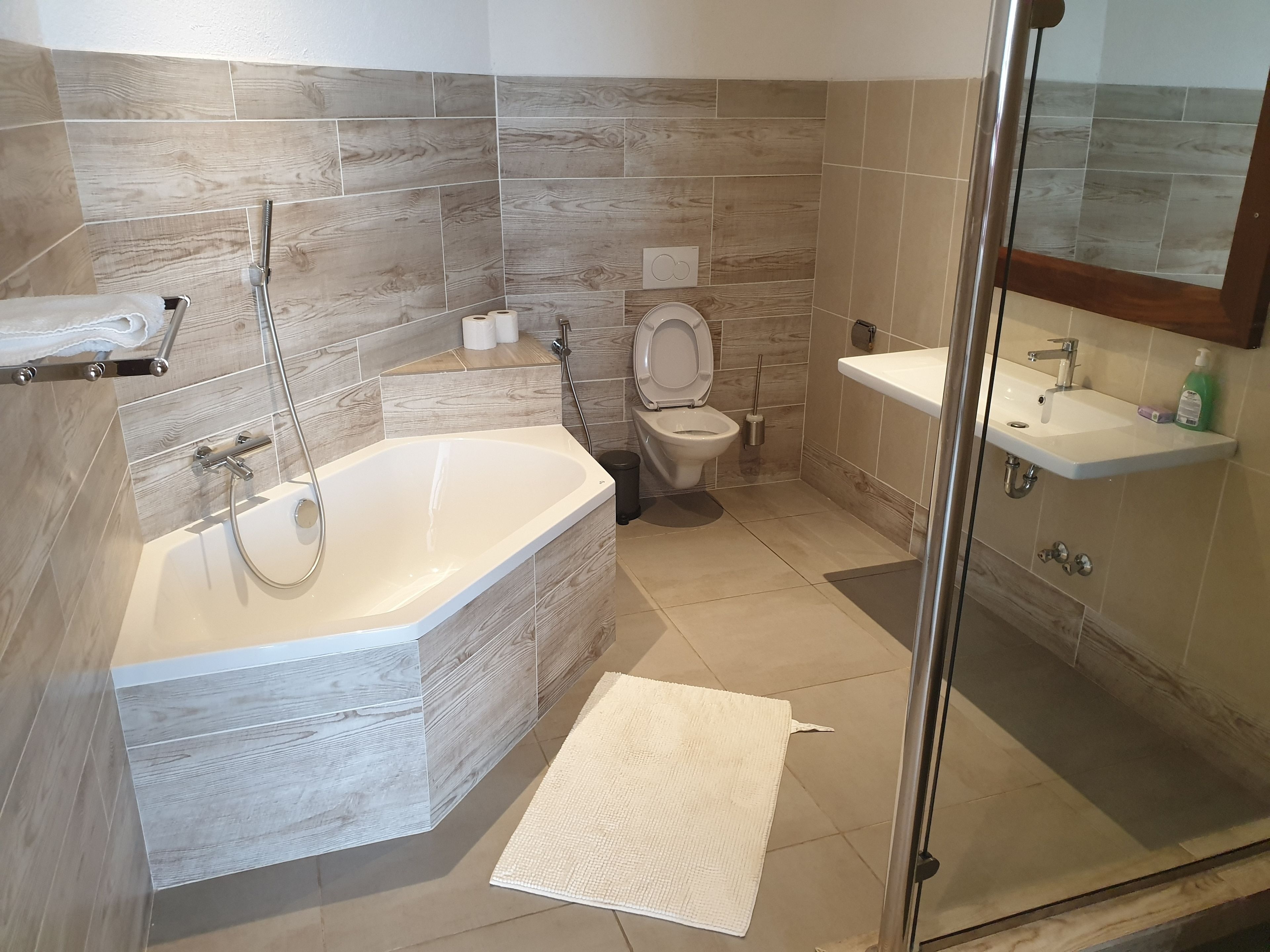 panoramic suite, ocean view | bathroom | towels, toilet paper