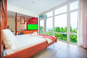 Panoramic Suite, Ocean View | Premium bedding, in-room safe, soundproofing, iron/ironing board