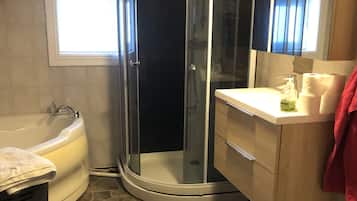 City House | Bathroom | Shower, towels, soap, toilet paper