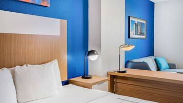 Desk, laptop workspace, blackout curtains, iron/ironing board