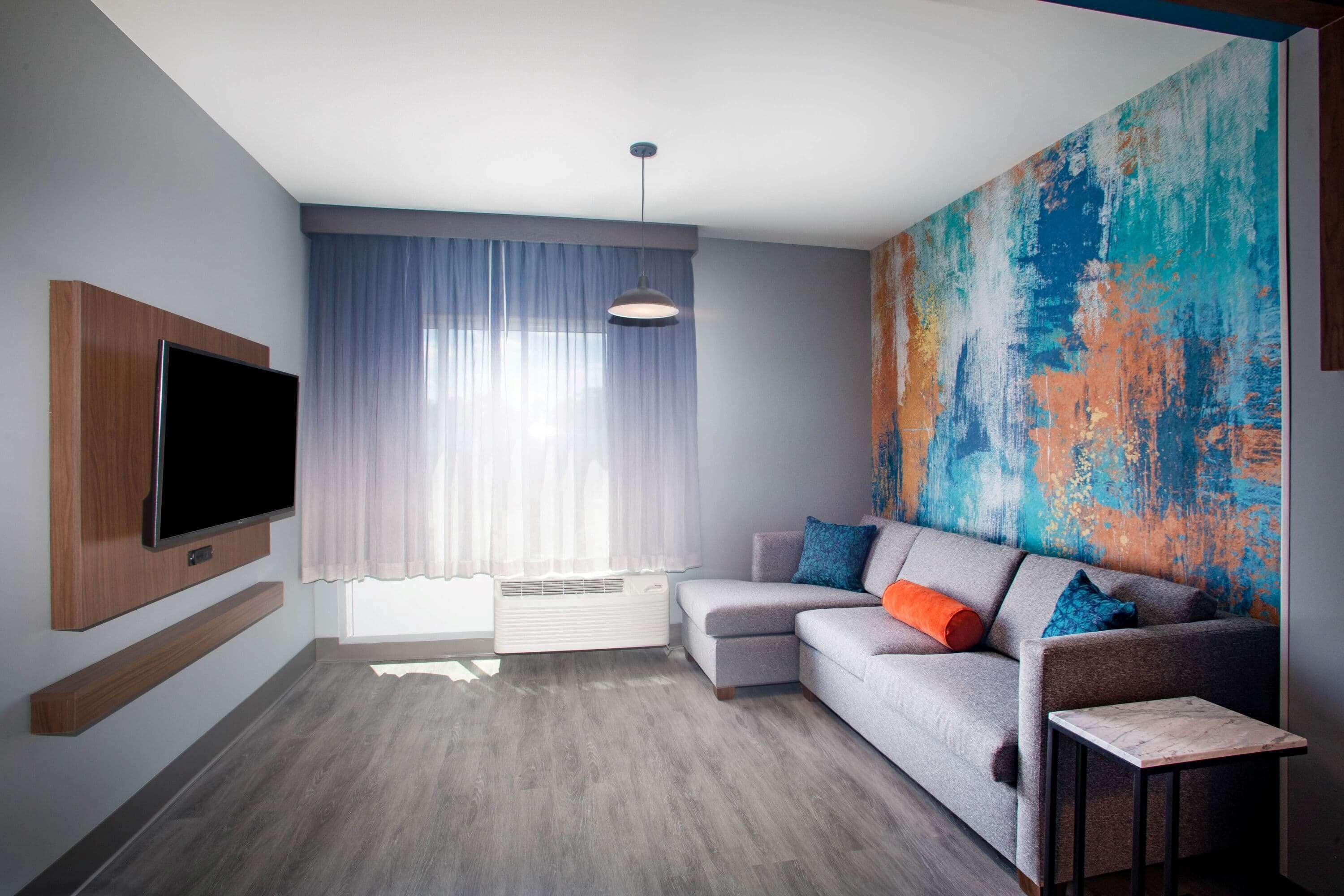 desk, laptop workspace, blackout curtains, iron/ironing board