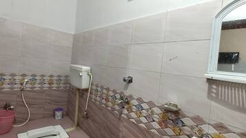 Deluxe Double Room, City View | Bathroom | Shower, rainfall showerhead, free toiletries, bathrobes