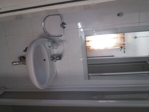 Shower, towels, toilet paper