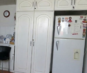 Fridge, microwave, cookware/dishes/utensils