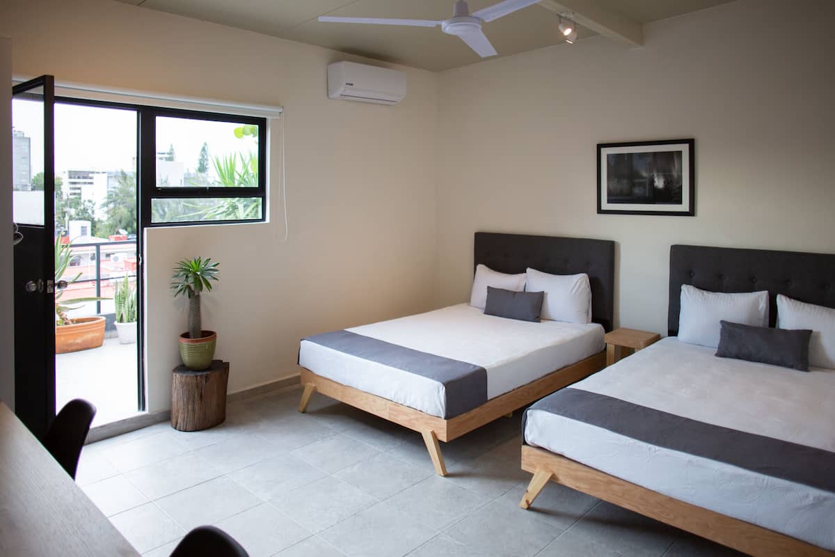 Deluxe Studio Suite, 2 Double Beds | Premium bedding, down duvets, individually decorated