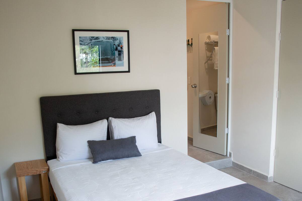 Premium bedding, down comforters, desk, laptop workspace