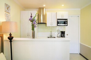 Fridge, microwave, coffee/tea maker, toaster