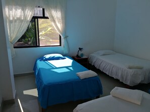 Basic Triple Room | Free WiFi, bed sheets - Hostal Insular (Puerto Villamil)