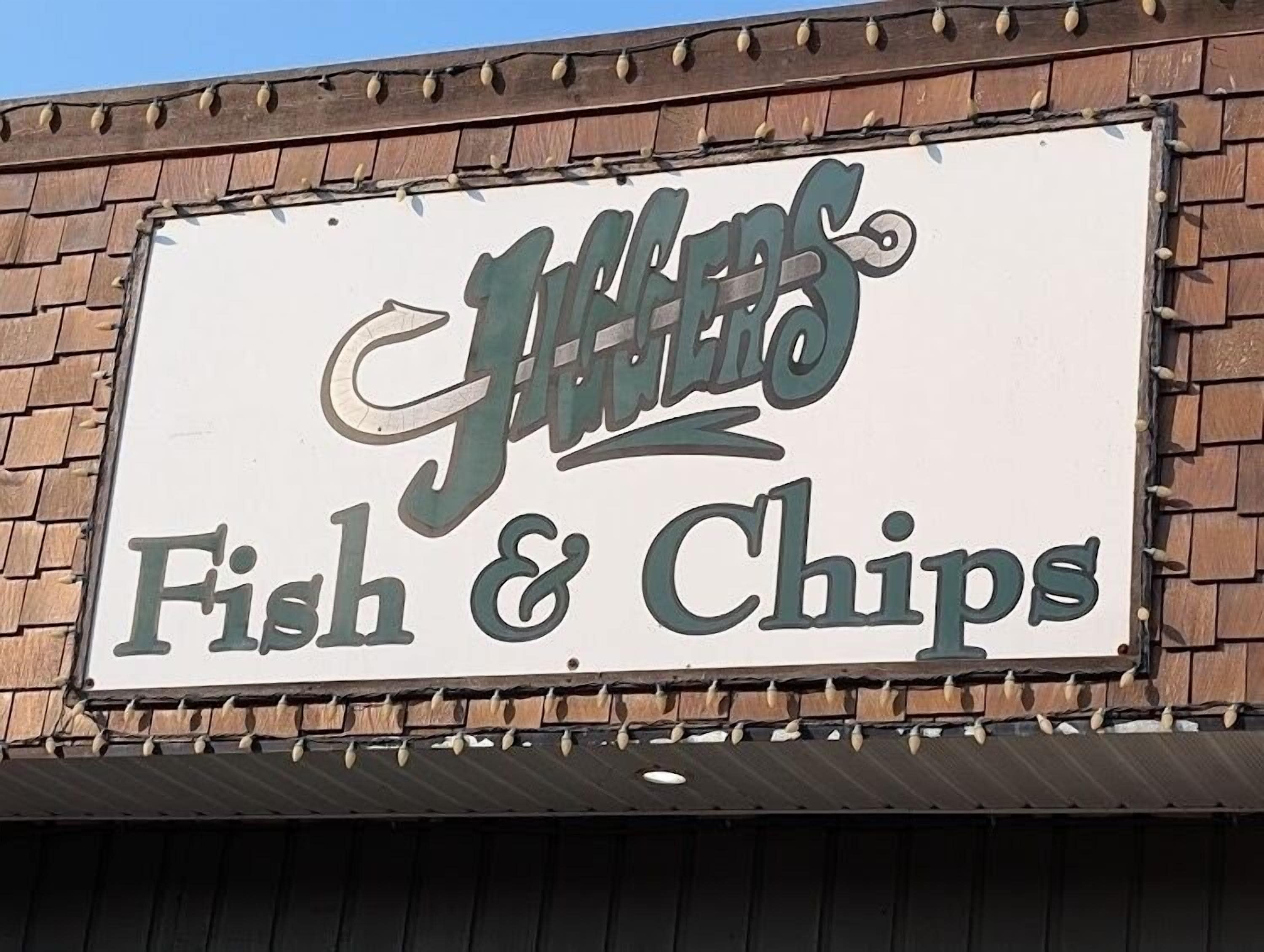 A sign for a restaurant named "Jill's Fish & Chips".