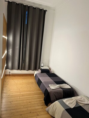 1 slaapkamer, een strijkplank/strijkijzer, wifi, beddengoed