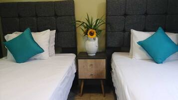 Premium bedding, down duvets, memory-foam beds, iron/ironing board