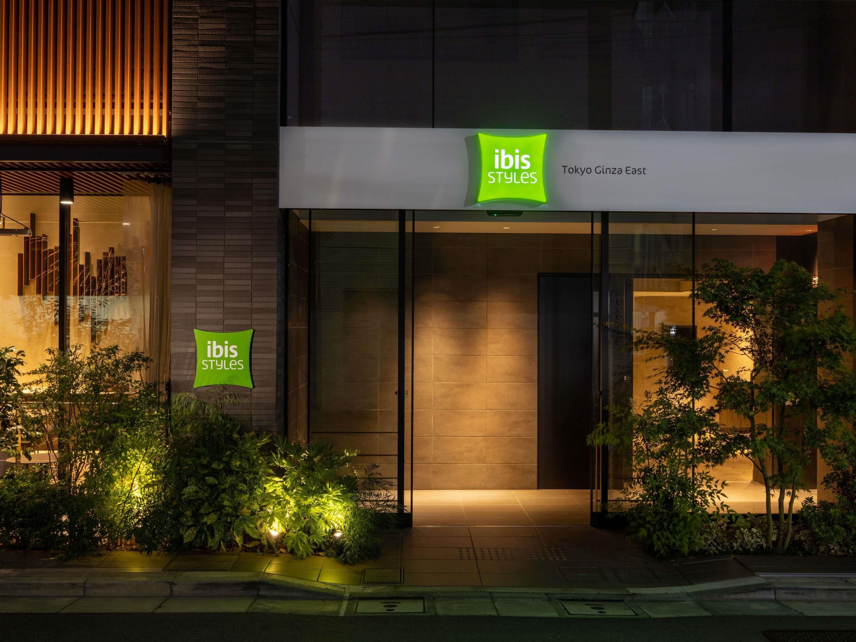 A building with signage for 'ibis Styles' at Tokyo Ginza East.
