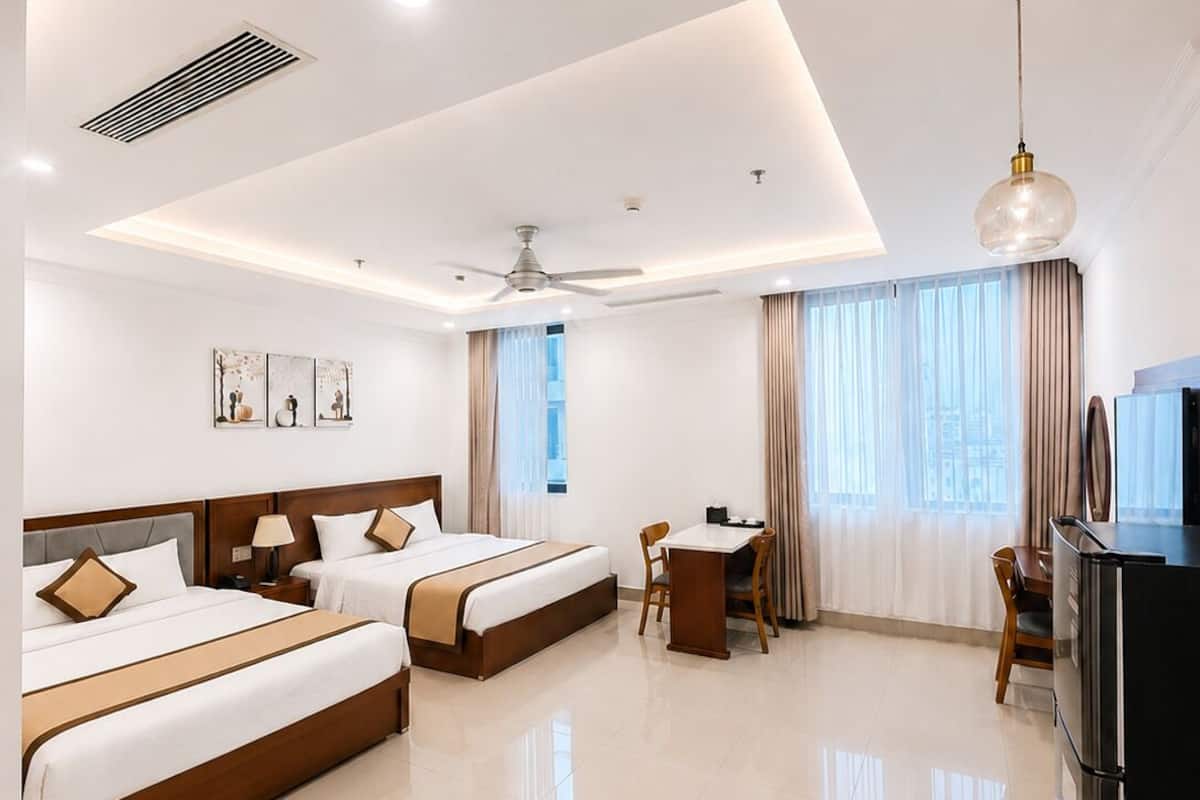 Minibar, desk, laptop workspace, blackout curtains