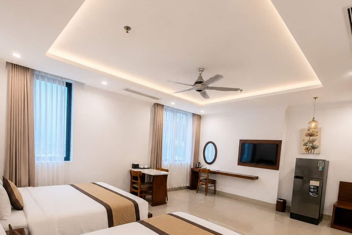 Minibar, desk, laptop workspace, blackout curtains