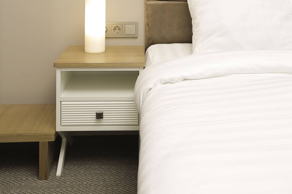 Standard Double or Twin Room | In-room safe, desk, laptop workspace, blackout curtains