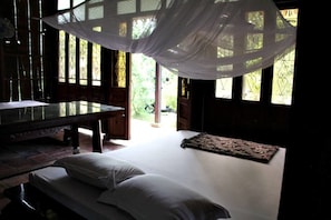 Habitación cuádruple, vista al jardín | Wifi gratis 