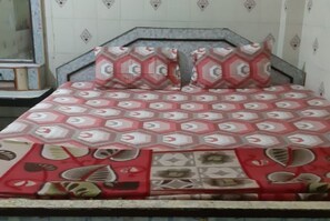 Egyptian cotton sheets, premium bedding, down duvets, memory-foam beds - Goroomgo Neelachal Lodge Puri (Puri)
